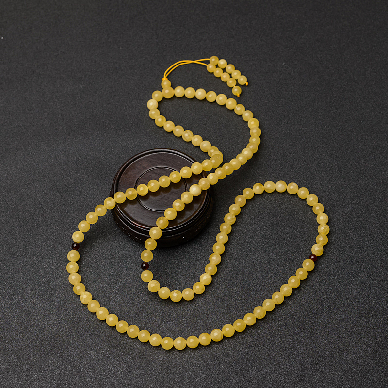 8.5mm鸡油黄蜜蜡佛珠-红掌柜