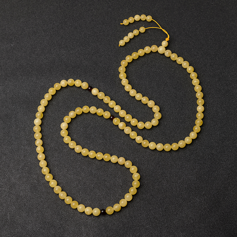 8.5mm鸡油黄蜜蜡佛珠-红掌柜