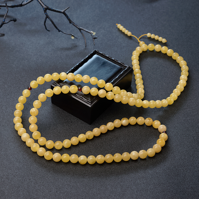 9.5mm白花蜜蜜蜡108佛珠-红掌柜