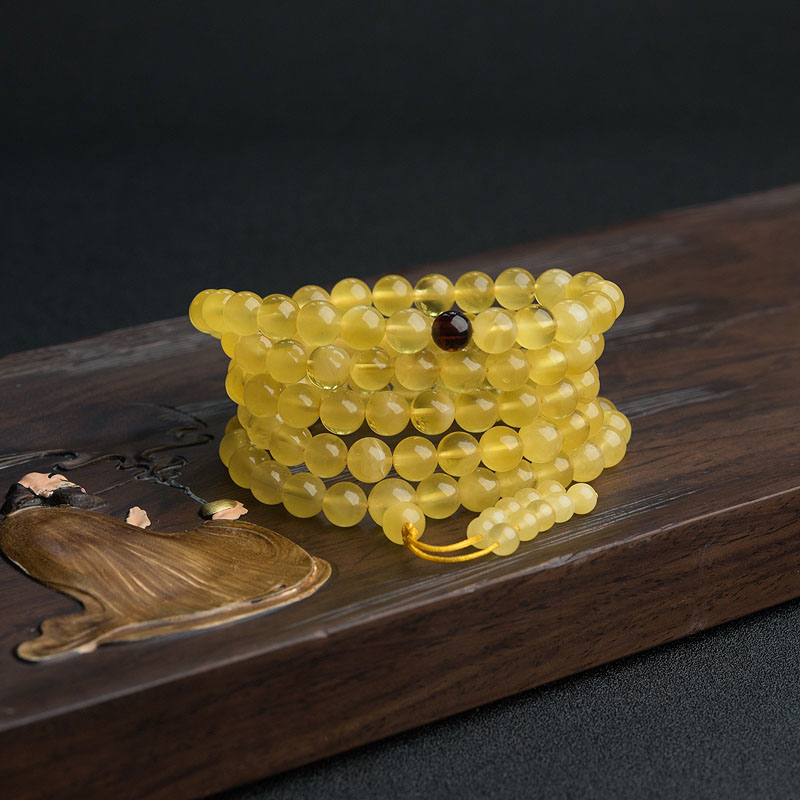 鸡油黄金绞蜜佛珠-红掌柜