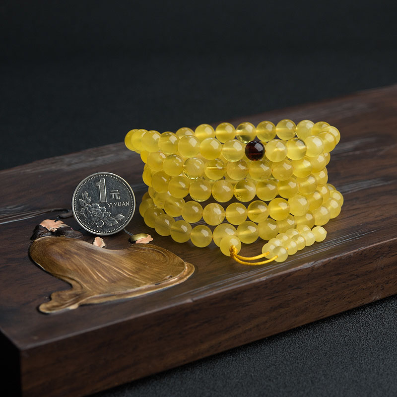 天然金绞蜜108佛珠-红掌柜