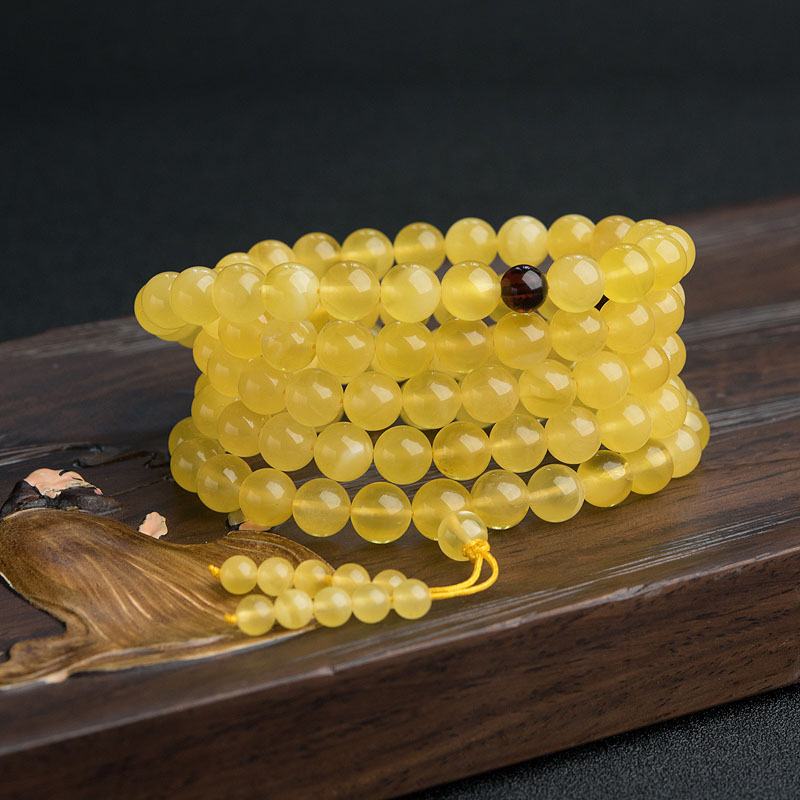 9mm金绞蜜108佛珠-红掌柜