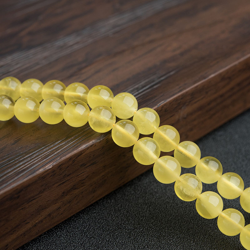 8mm鸡油黄金绞蜜佛珠-红掌柜