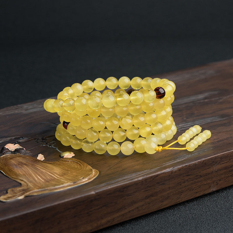 8mm金绞蜜佛珠-红掌柜