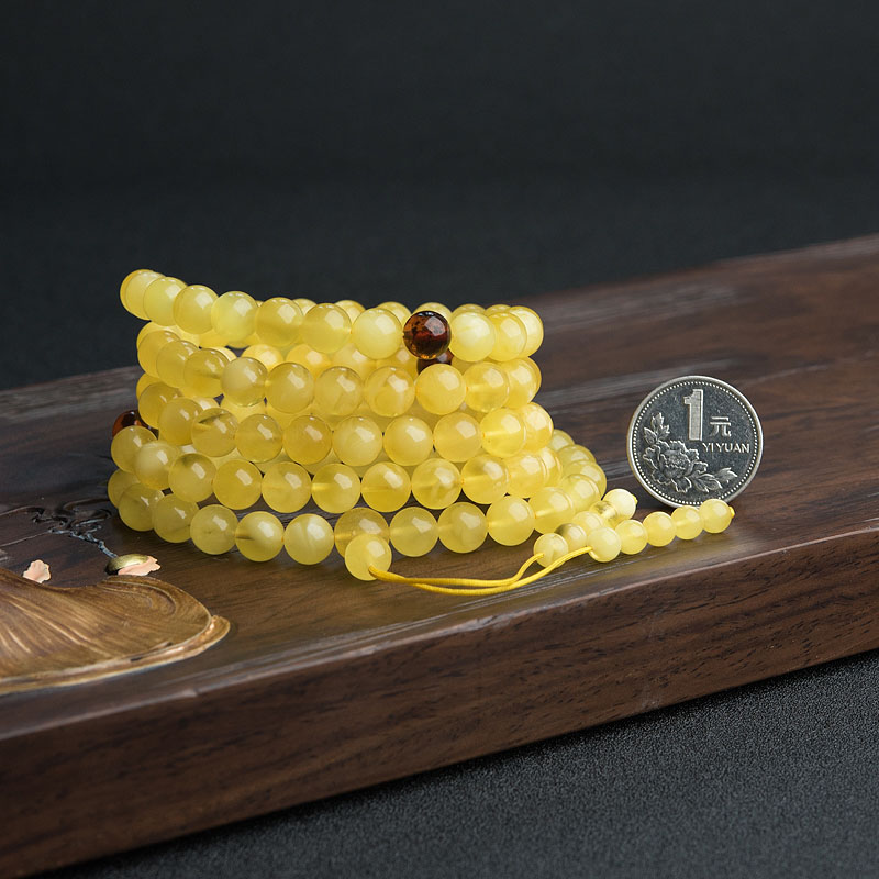 8.5mm金绞蜜佛珠-红掌柜