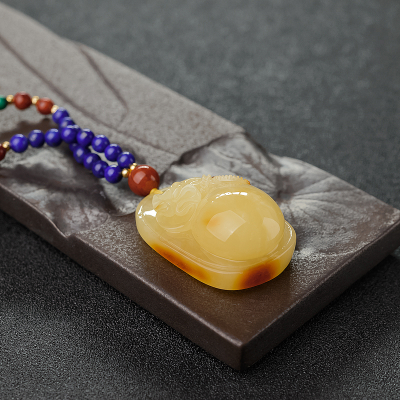 俏色蜜蜡钱袋-红掌柜