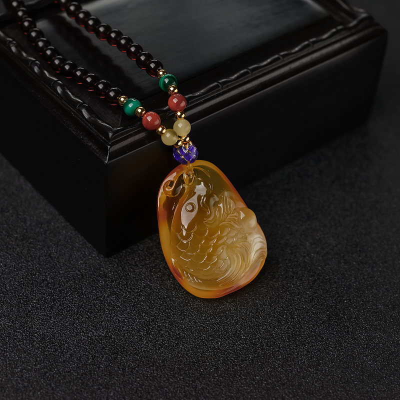 俏色金绞蜜吊坠-红掌柜