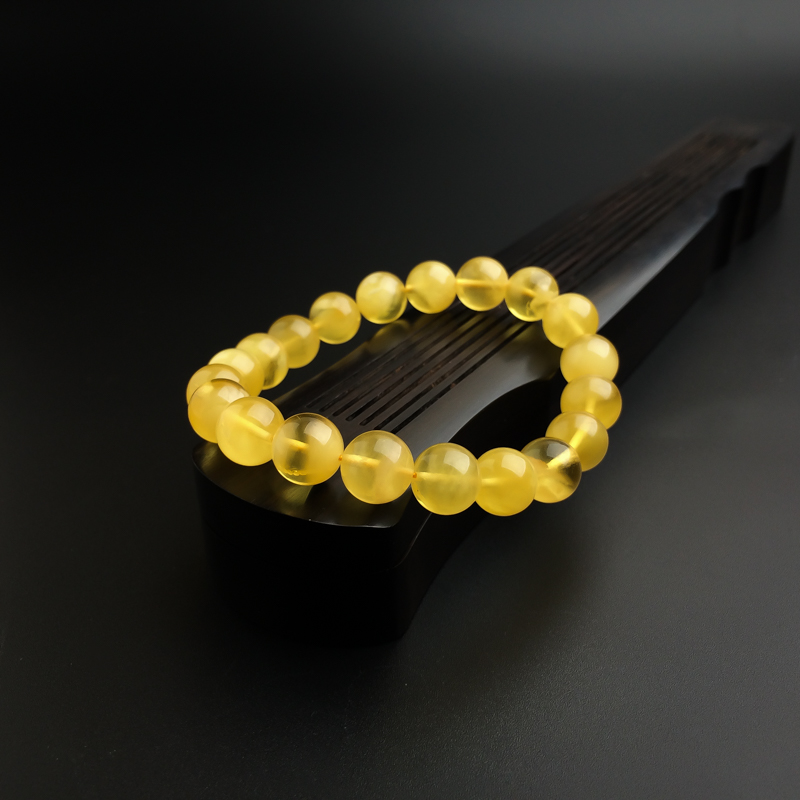 波罗的海天然金绞蜜手串 - 红掌柜