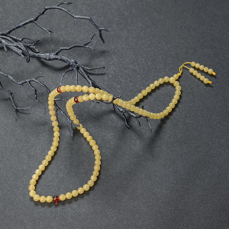 7mm鸡油黄金绞蜜108佛珠-红掌柜