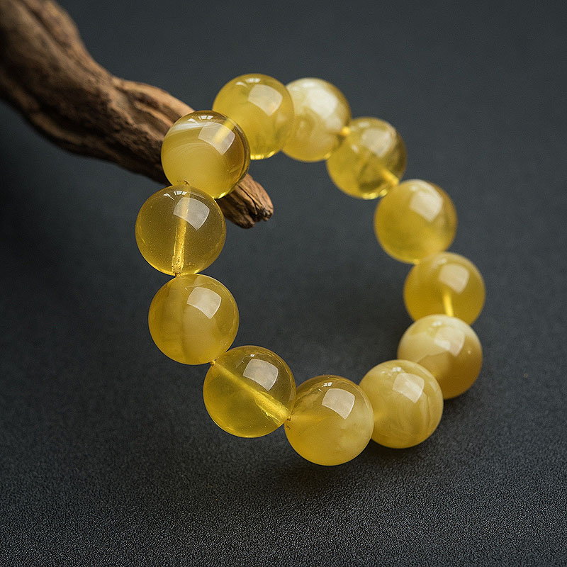 鸡油黄金绞蜜手串-红掌柜