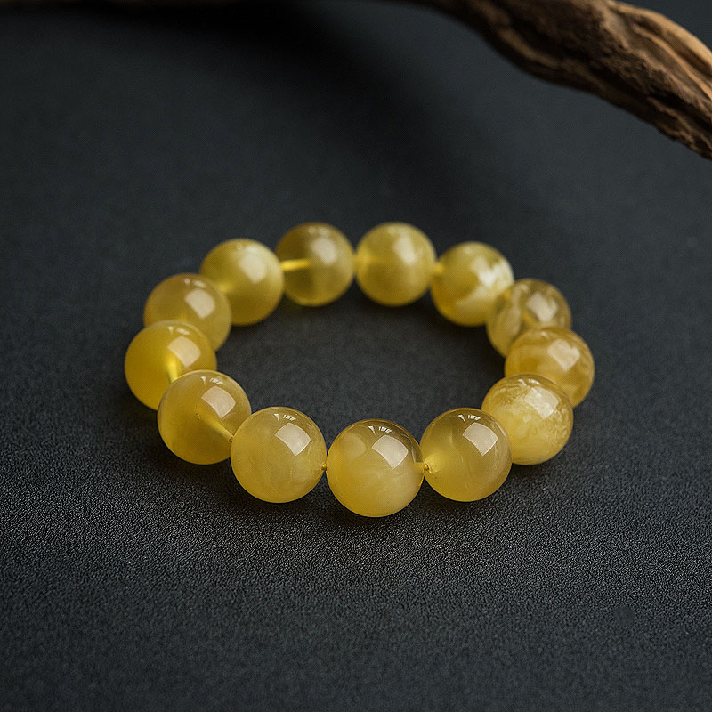 鸡油黄金绞蜜手串-红掌柜