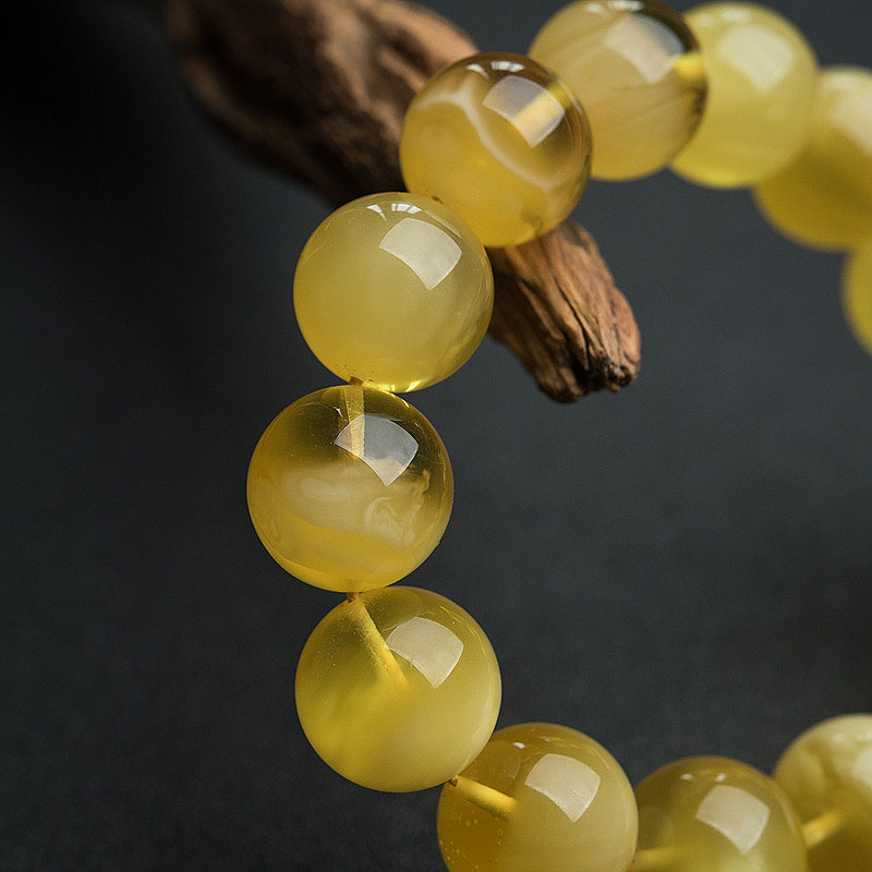天然15mm鸡油黄金绞蜜手串-红掌柜