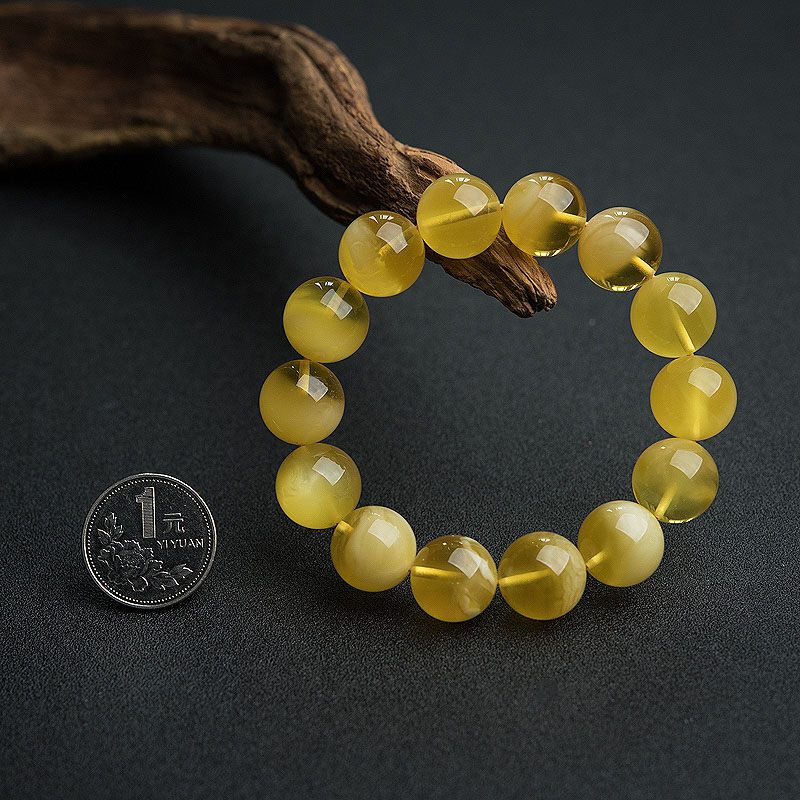 天然鸡油黄金绞蜜手串-红掌柜