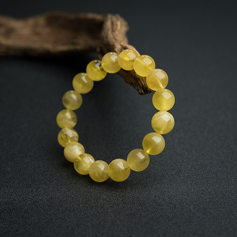 12mm鸡油黄金绞蜜手串-红掌柜