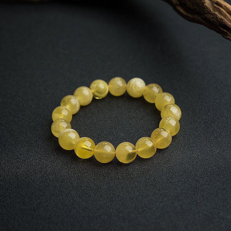 鸡油黄金绞蜜手串-红掌柜