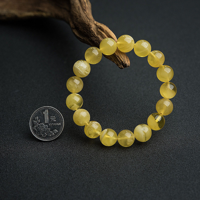 天然鸡油黄金绞蜜手串-红掌柜