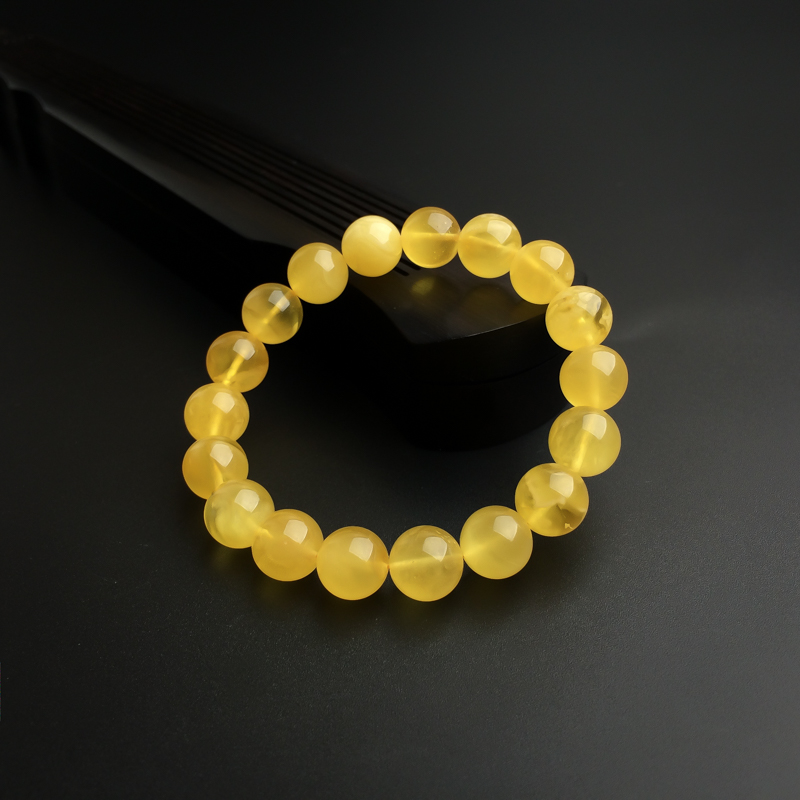 波罗的海天然金绞蜜手串 - 红掌柜