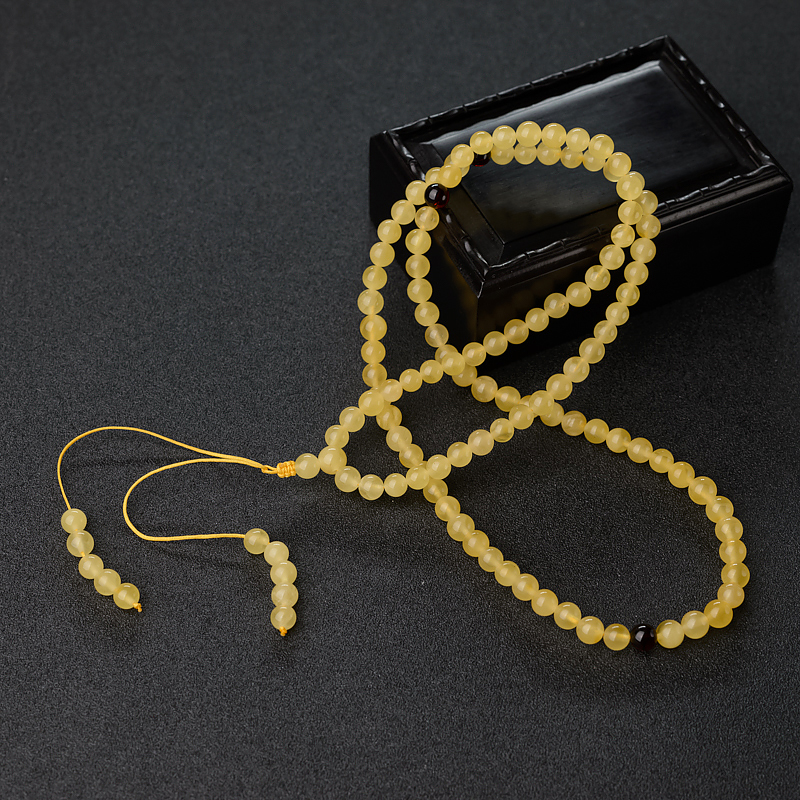 6mm鸡油黄金绞蜜佛珠-红掌柜