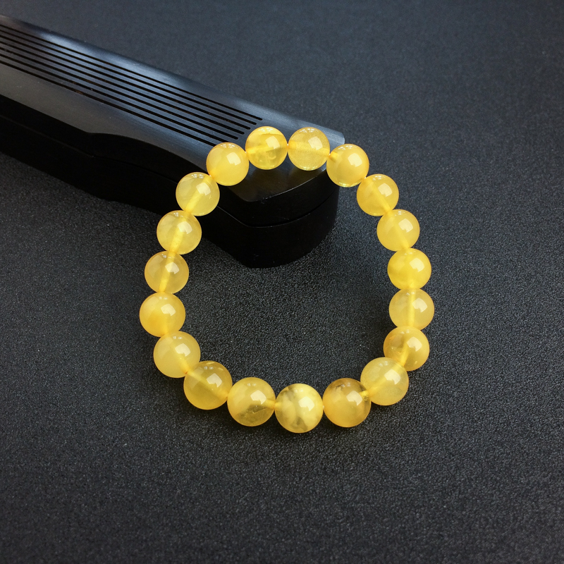 10mm波罗的海鸡油黄金绞蜜蜜蜡手串-红掌柜