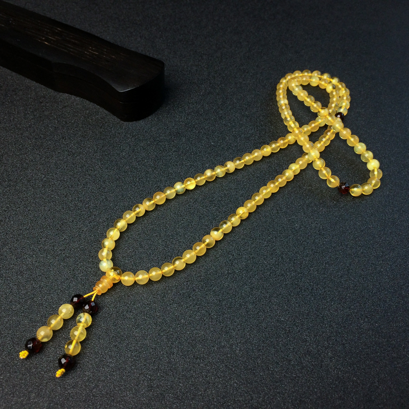 6mm波罗的海天然金绞蜜蜜蜡佛珠-红掌柜