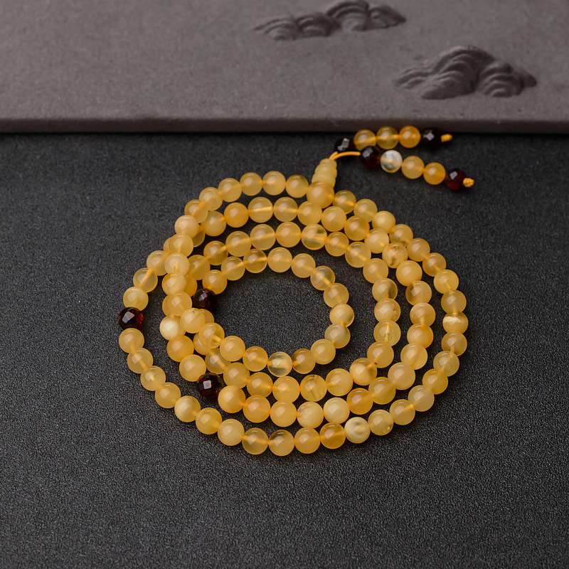 鸡油黄金绞蜜佛珠-红掌柜