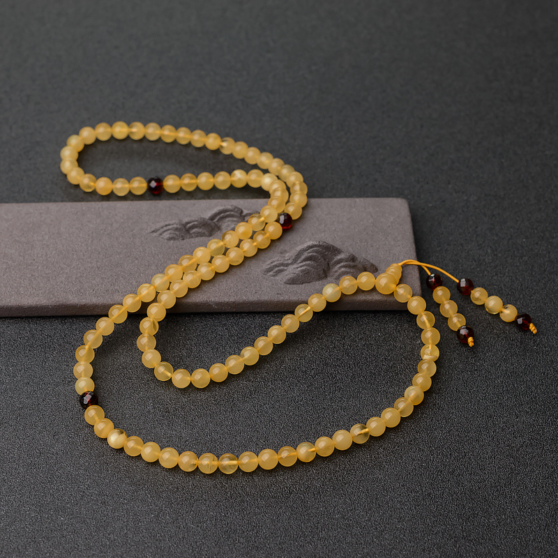 6.5mm鸡油黄金绞蜜佛珠-红掌柜