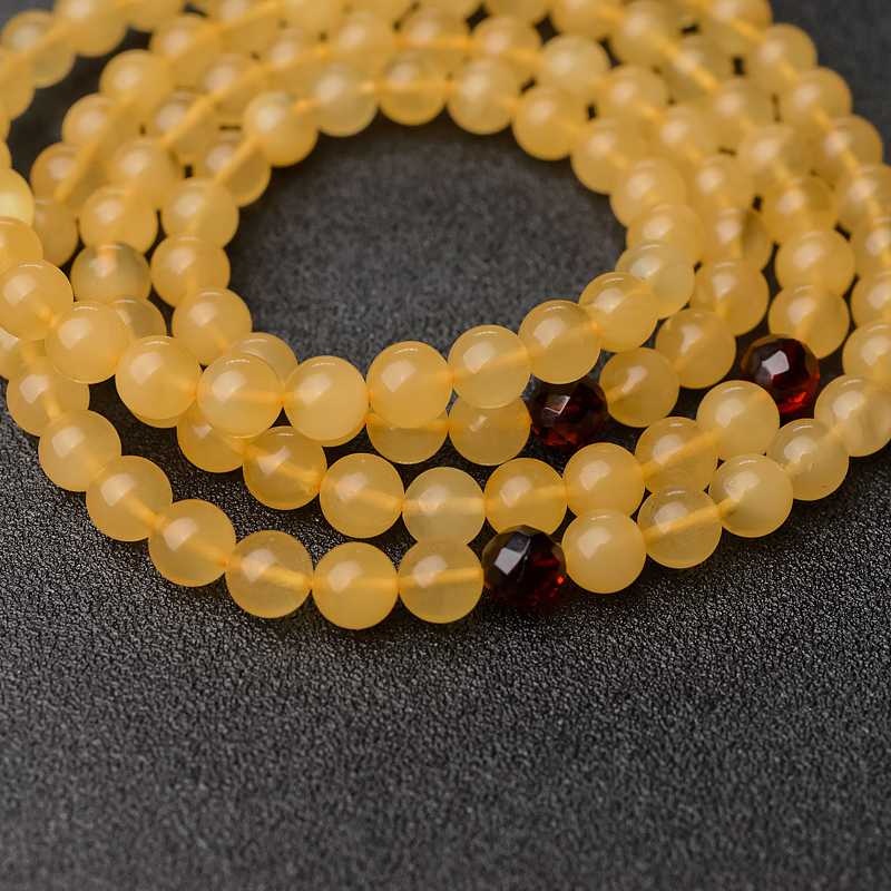 鸡油黄金绞蜜佛珠-红掌柜