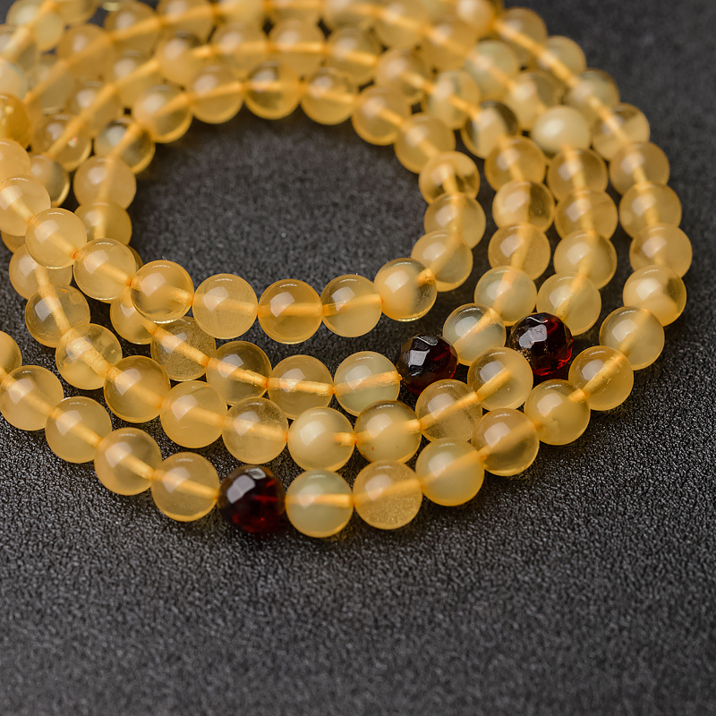 鸡油黄金绞蜜佛珠-红掌柜