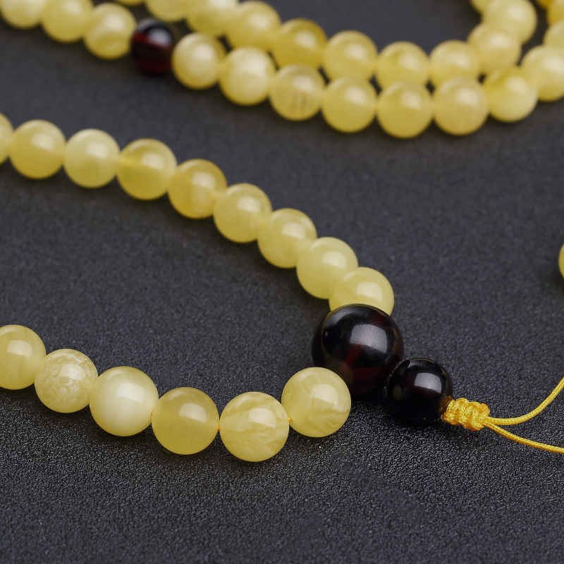 波罗的海天然鸡油黄金绞蜜佛珠-红掌柜