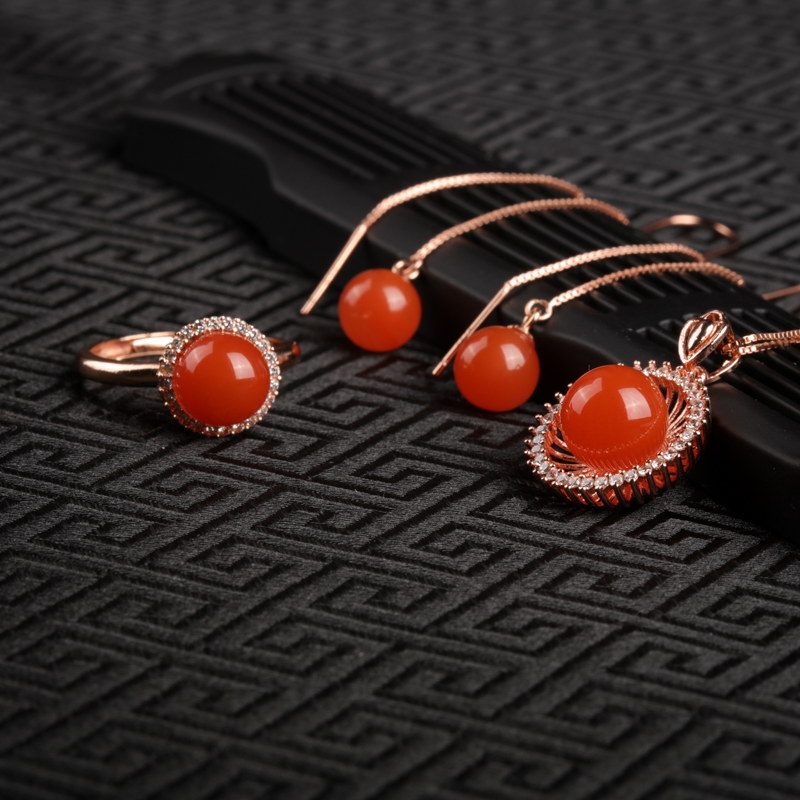 银镶樱桃红南红戒指-红掌柜