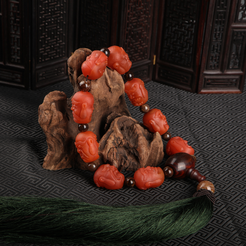 南红罗汉头手把件-红掌柜