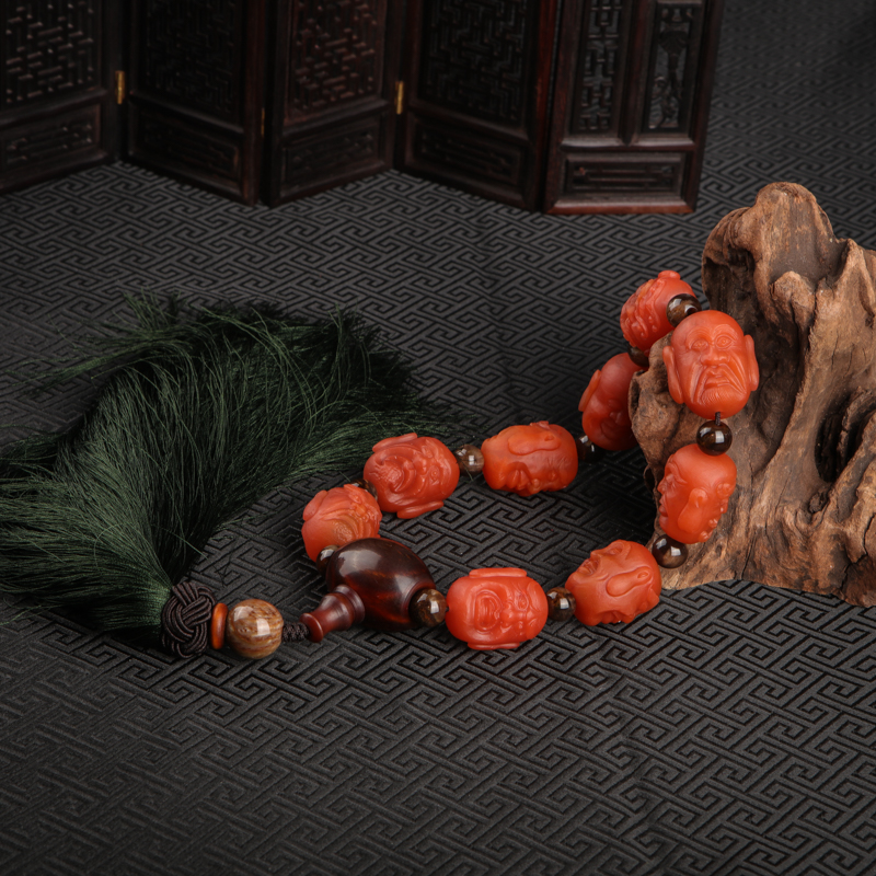 柿子红南红手把件-红掌柜