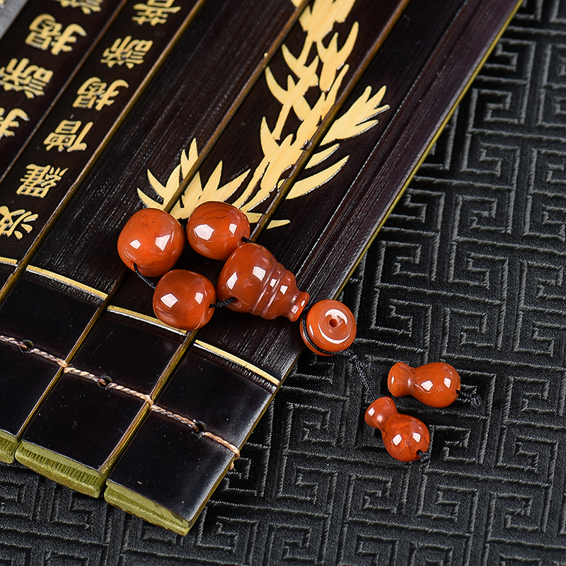 天然火焰纹南红配珠一套-红掌柜