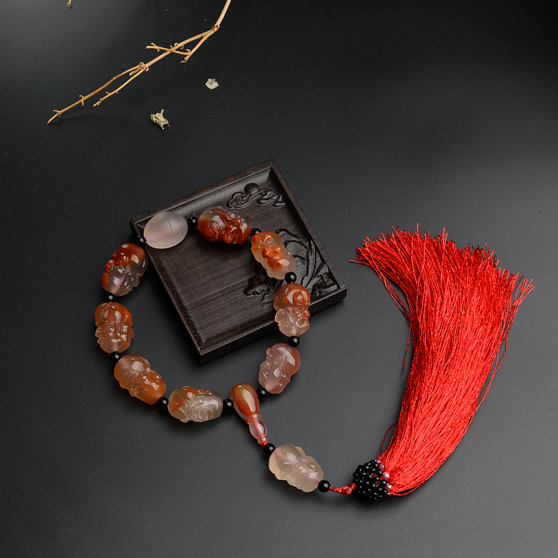 冰飘南红十八罗汉手把件-红掌柜