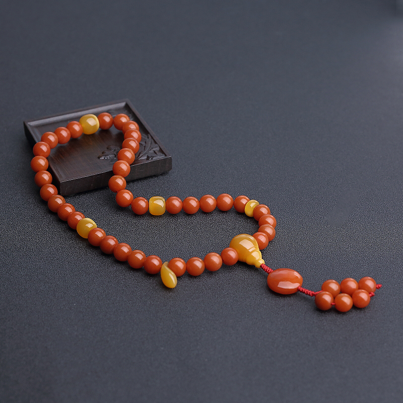 云南保山天然柿子红南红手持 - 红掌柜