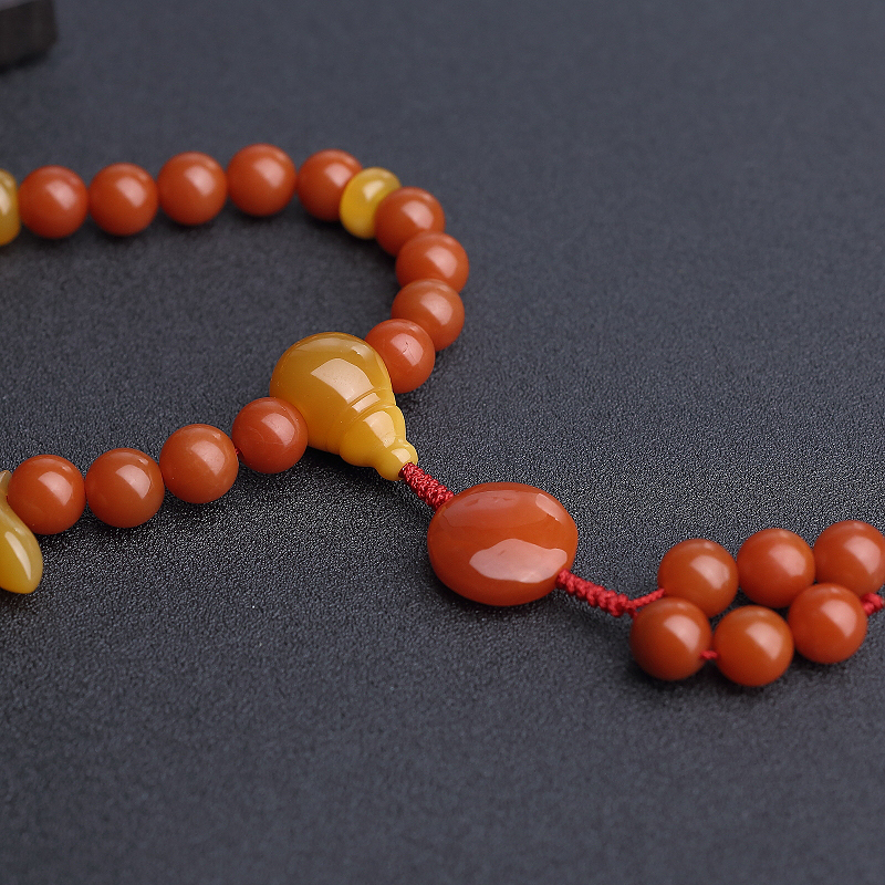 保山天然柿子红南红手持 - 红掌柜