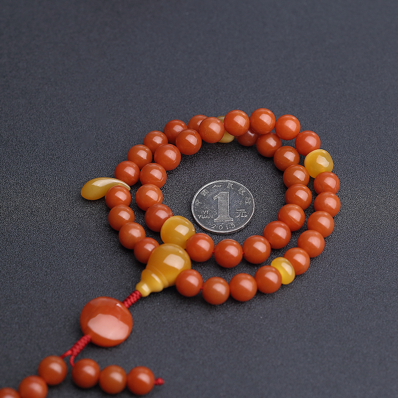 云南柿子红南红手持 - 红掌柜