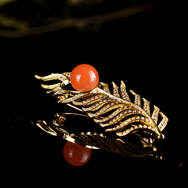 合金镶南红胸针-红掌柜