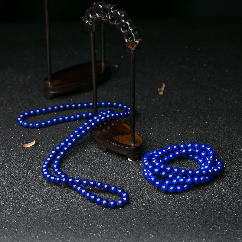 深蓝色青金石佛珠-红掌柜