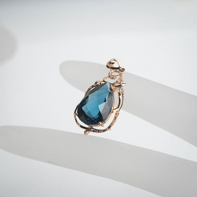 18k镶托帕石吊坠-红掌柜