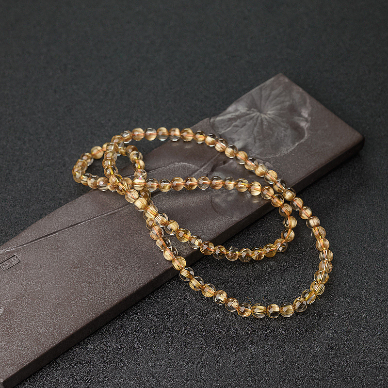 6mm钛金发晶手串-红掌柜