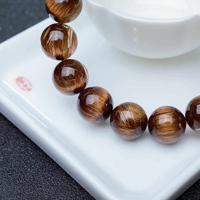 猫眼铜发晶手串-红掌柜