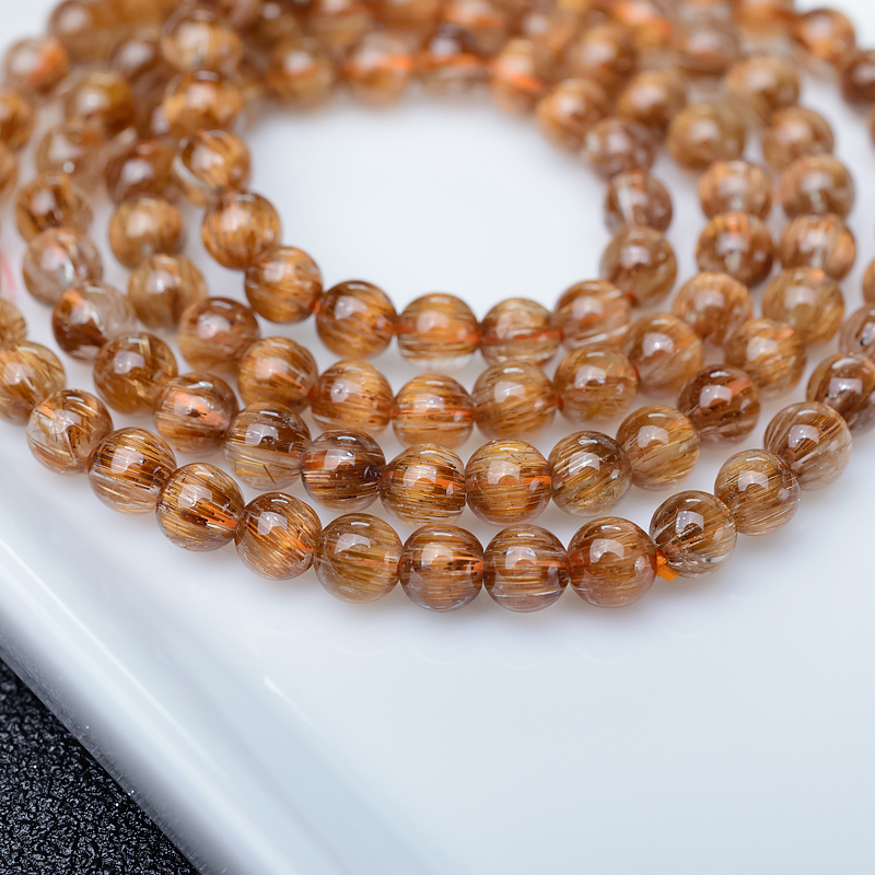 铜发晶多圈手串-红掌柜