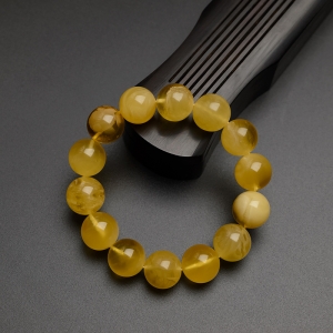 14mm金绞蜜鸡油黄蜜蜡手串