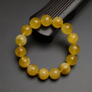 14mm金绞蜜鸡油黄蜜蜡手串