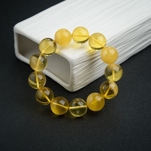 16mm鸡油黄金绞蜜手串