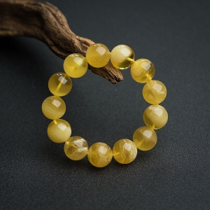 16mm鸡油黄金绞蜜手串