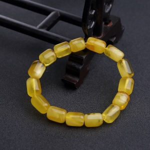 鸡油黄金绞蜜桶珠手串