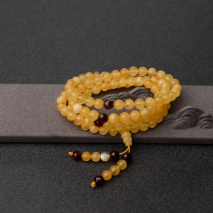 6.5mm鸡油黄金绞蜜108佛珠