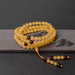 6.5mm鸡油黄金绞蜜108佛珠